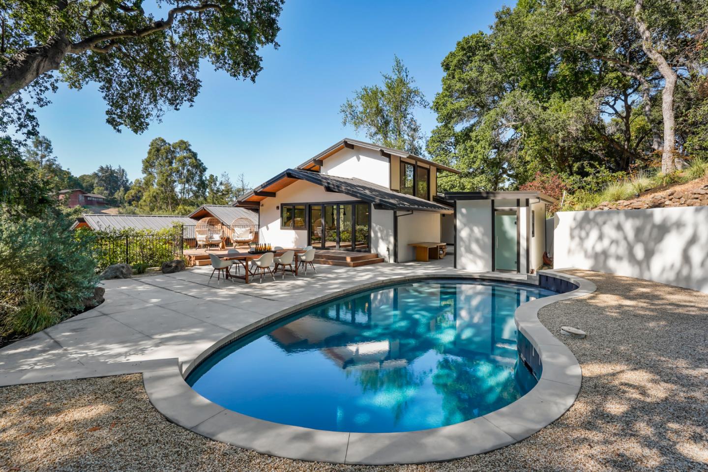 375 Walsh Road Atherton, CA 94027 - Photo 5 of 7 a view of a house with swimming pool