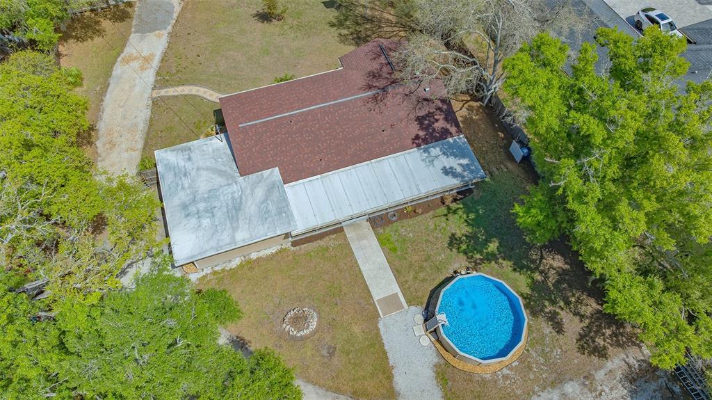 3818 Gocio Rd Extention Sarasota, FL 34235 - Photo 62 of 65 an aerial view of a house with swimming pool