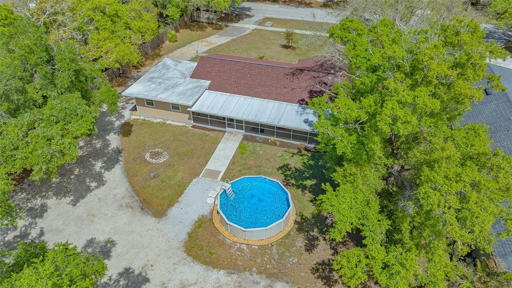 3818 Gocio Rd Extention Sarasota, FL 34235 - Photo 63 of 65 an aerial view of a house with a swimming pool