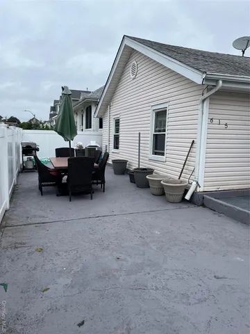 a view of a house and a patio