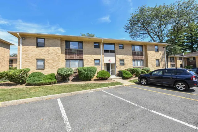 a car parked in front of a house