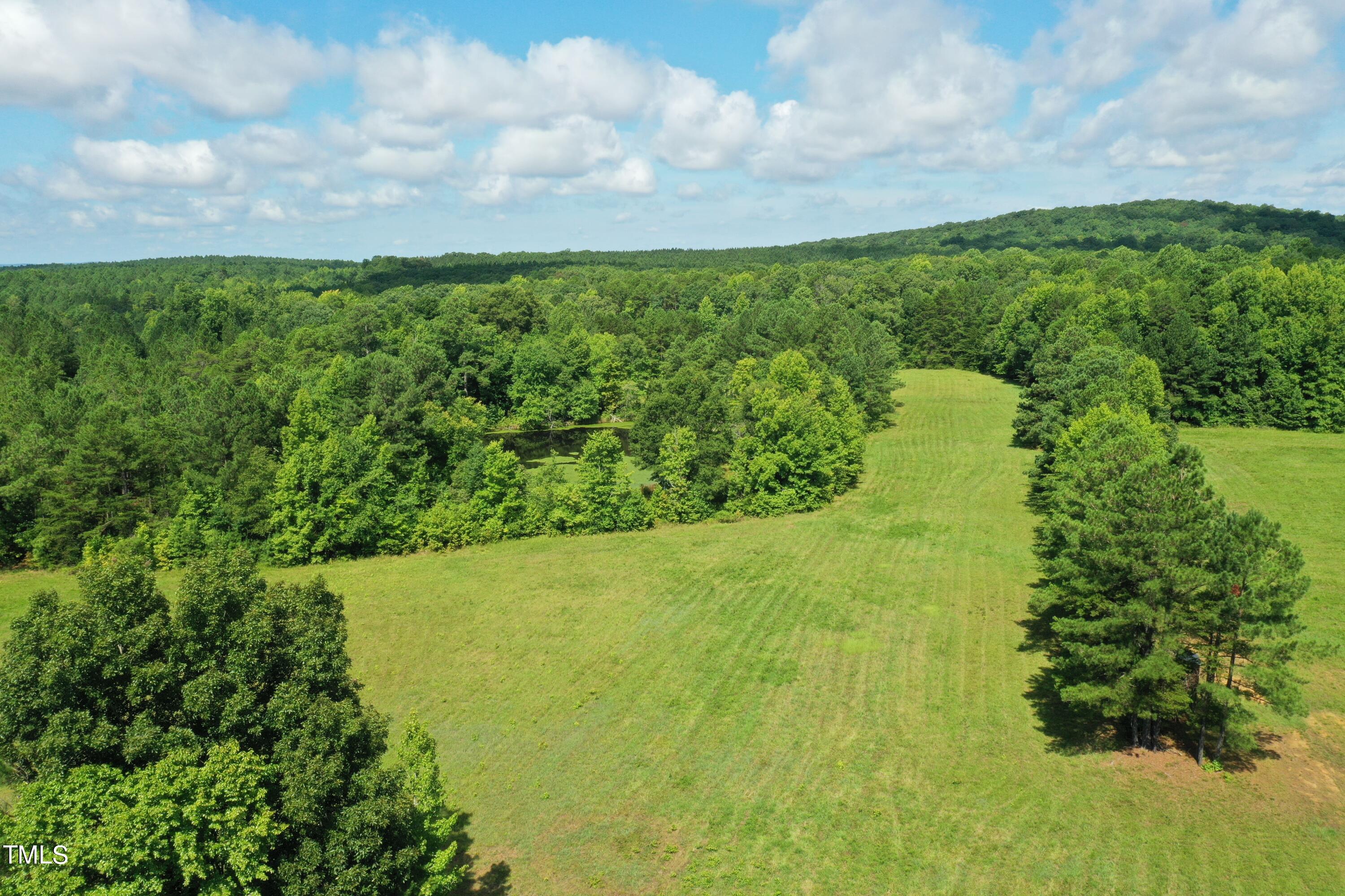 0 Range Road Stem, NC 27581 - Photo 1 of 35 a view of a yard with a garden