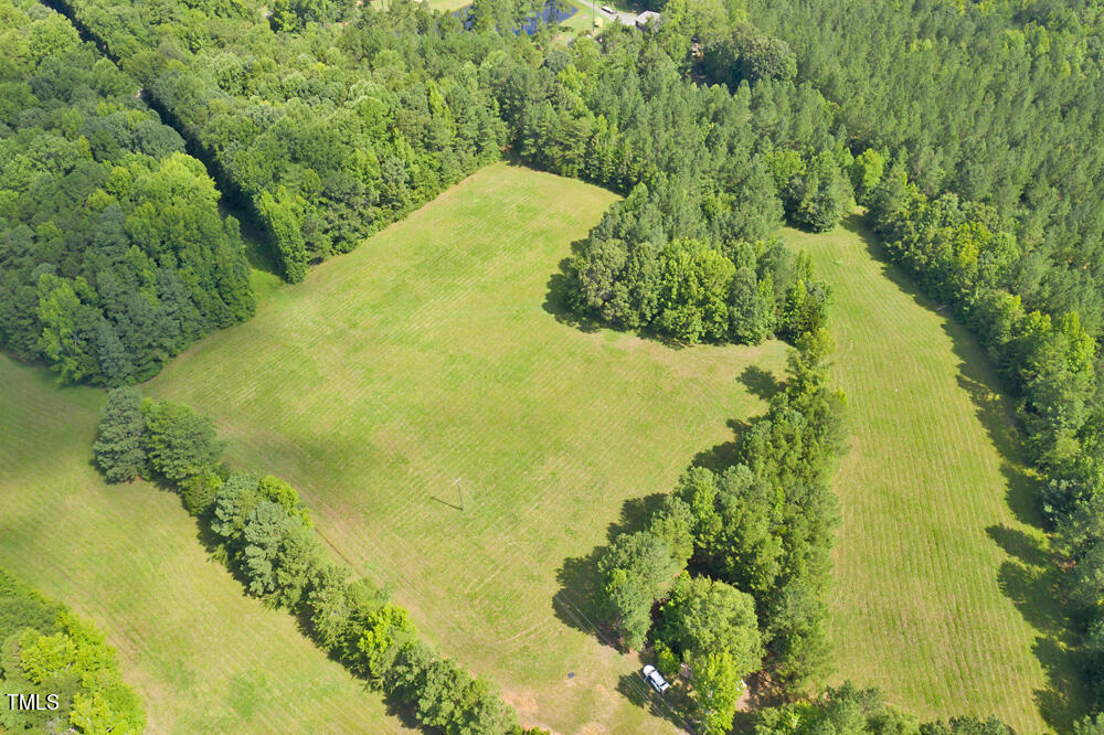 0 Range Road Stem, NC 27581 - Photo 3 of 35 a view of a garden with an ocean