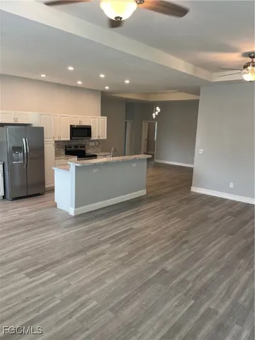 a view of kitchen and microwave