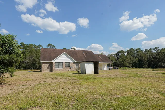 a view of a yard with a barn
