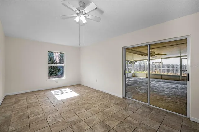 a view of an empty room and window