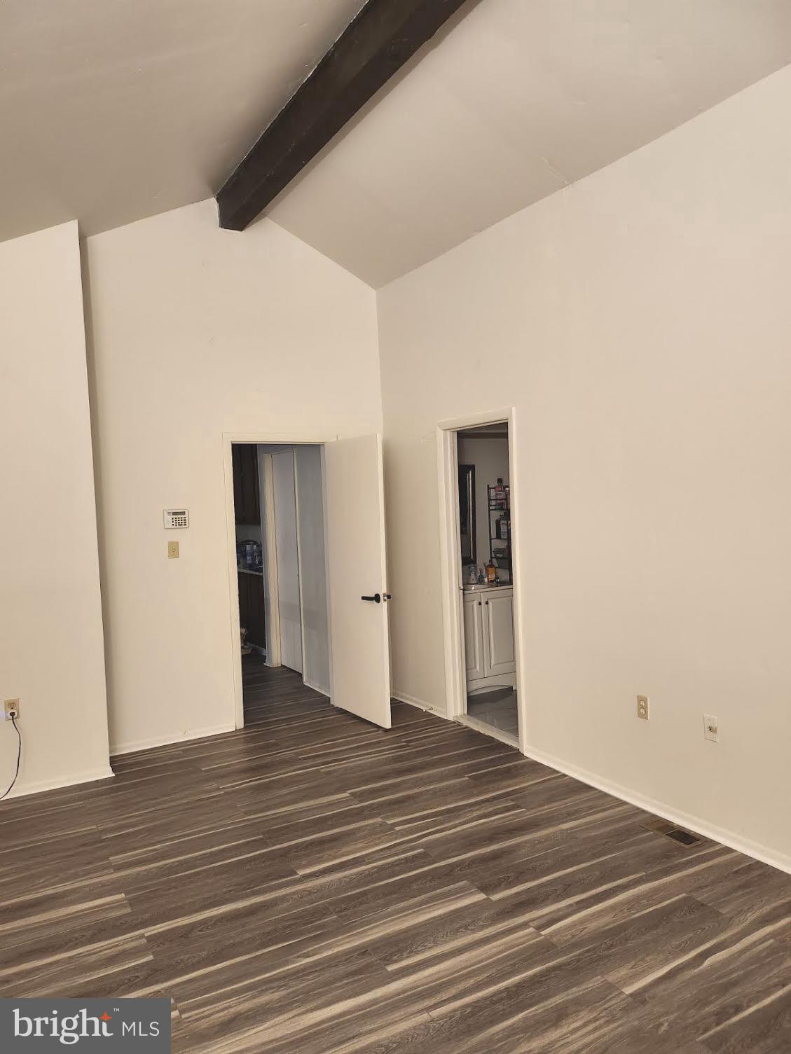 9129 Tulip Grove Road Gaithersburg, MD 20879 - Photo 13 of 23 a view of a livingroom with wooden floor and closet