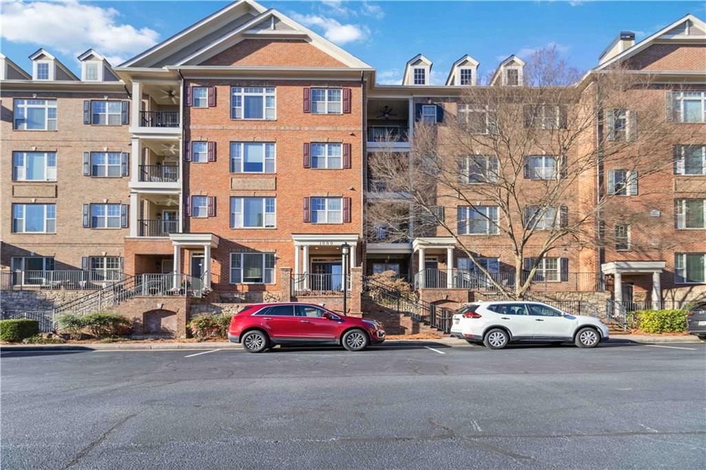 2300 Peachford Road, Unit 1410 Atlanta, GA 30338 - Photo 1 of 31 a car parked in front of a building