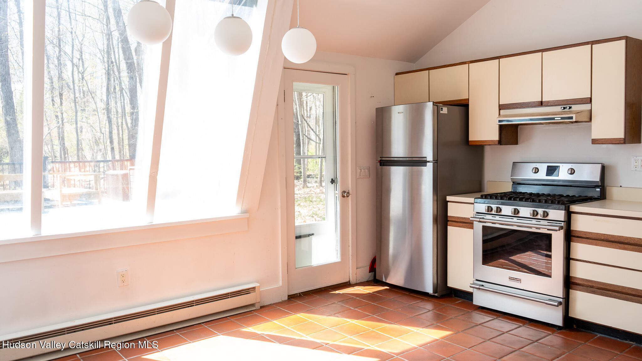 41 Pond Hill Road Copake, NY 12521 - Photo 6 of 25 a kitchen with a refrigerator and a stove