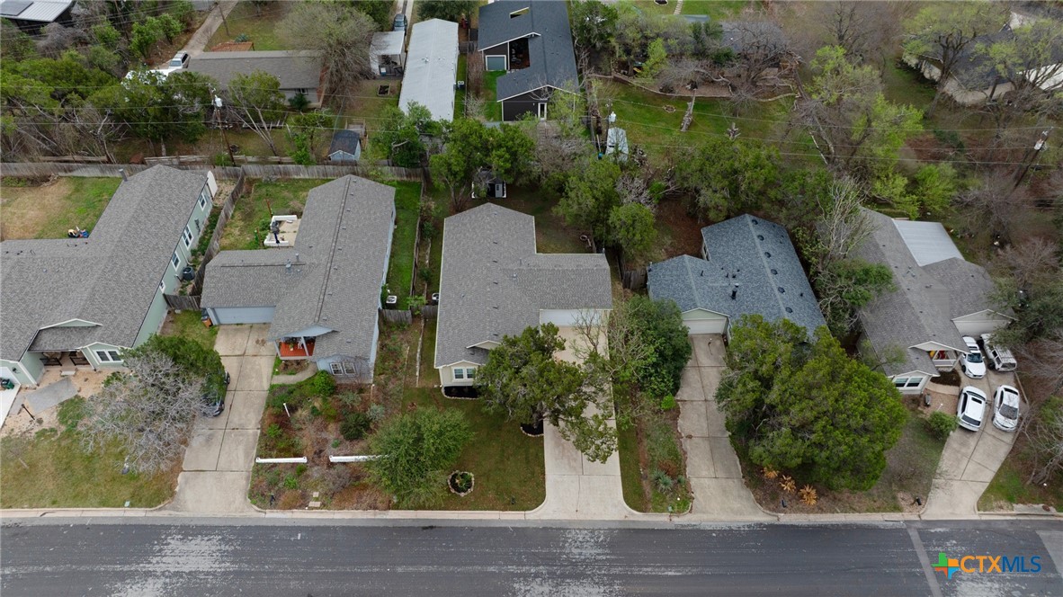 4607 Cedar Point Drive Austin, TX 78723 - Photo 22 of 27 an aerial view of a house with garden space and lake view