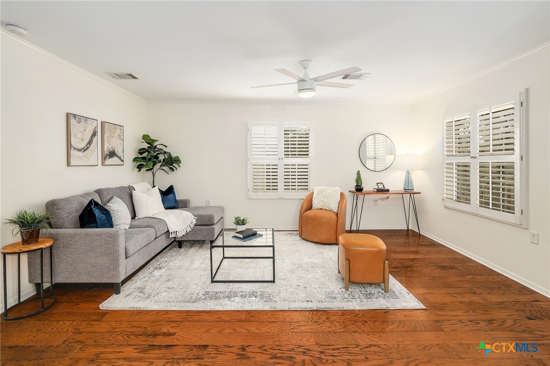 4607 Cedar Point Drive Austin, TX 78723 - Photo 3 of 27 a living room with furniture