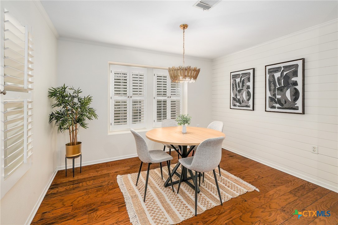 4607 Cedar Point Drive Austin, TX 78723 - Photo 5 of 27 a view of a dining room with furniture and window