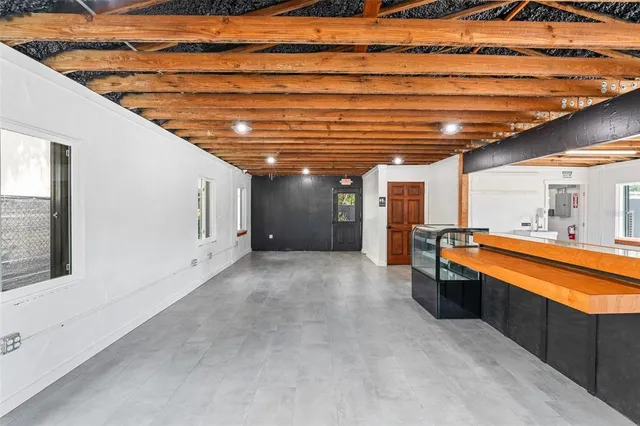 a room with furniture and window