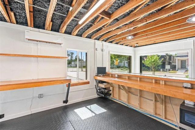 a outdoor dining space with furniture and outdoor view