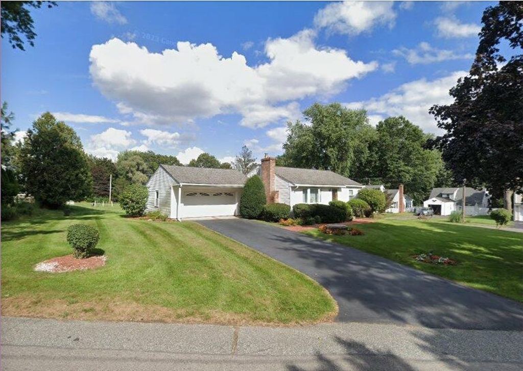 8 Greenwood Road Ashland, MA 01721 - Photo 1 of 29 a front view of a house with garden