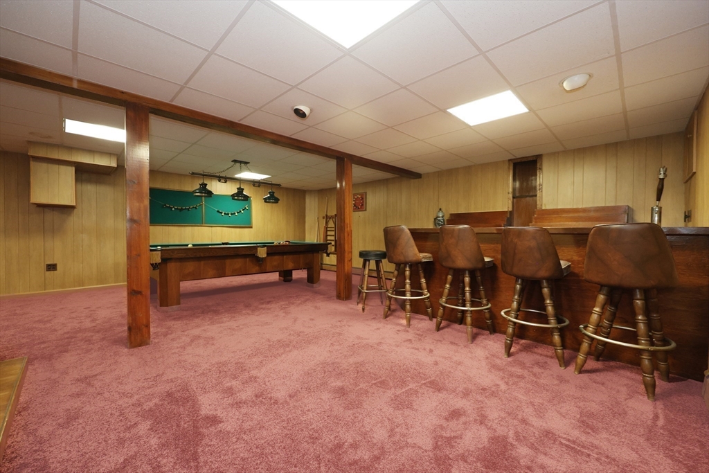 8 Greenwood Road Ashland, MA 01721 - Photo 24 of 29 a view of a room with furniture and air hockey table