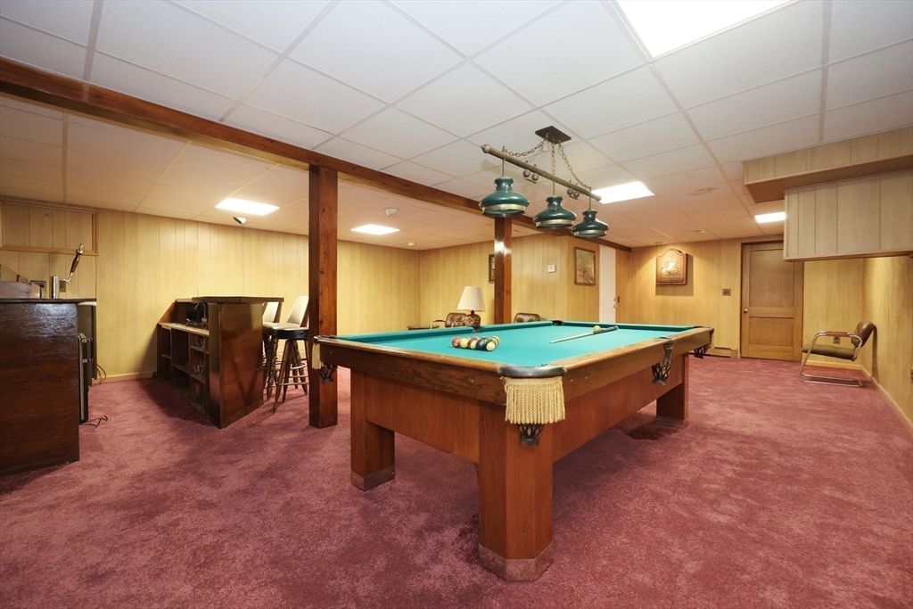 8 Greenwood Road Ashland, MA 01721 - Photo 25 of 29 a room with furniture and a table