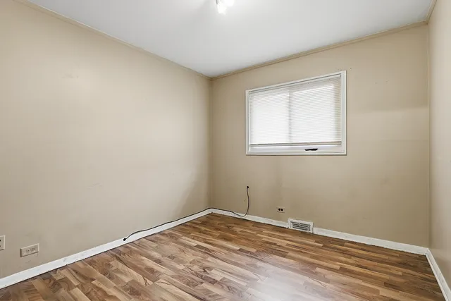 a view of a room that has a window in it