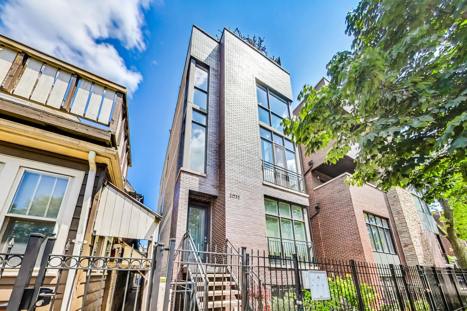 2035 North Leavitt Street, Unit 2 Chicago, IL 60647 - Photo 1 of 44 front view of a building