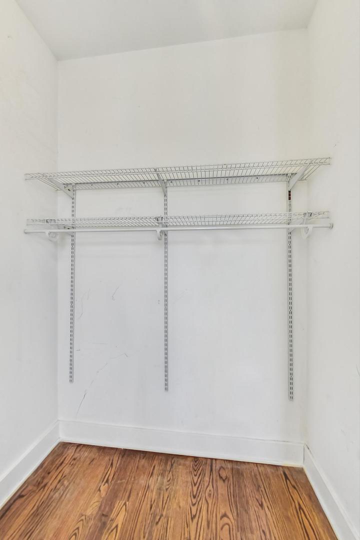 2035 North Leavitt Street, Unit 2 Chicago, IL 60647 - Photo 23 of 44 a view of an empty walk in closet