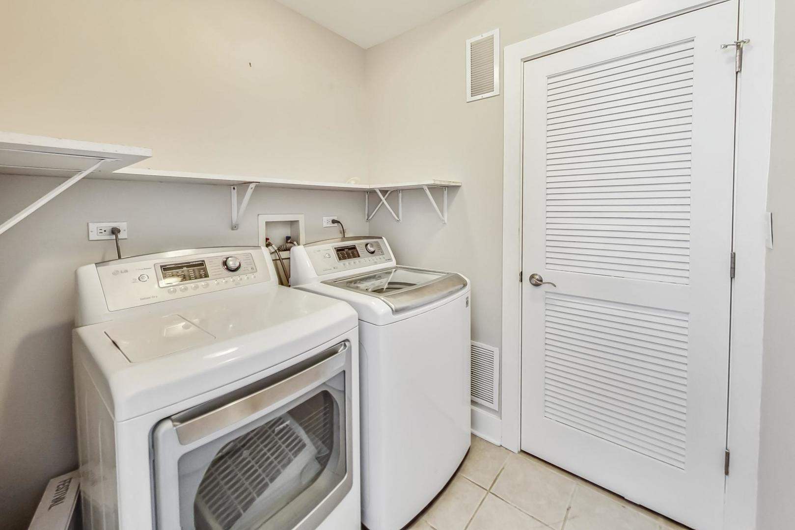 2035 North Leavitt Street, Unit 2 Chicago, IL 60647 - Photo 30 of 44 a utility room with dryer and washer