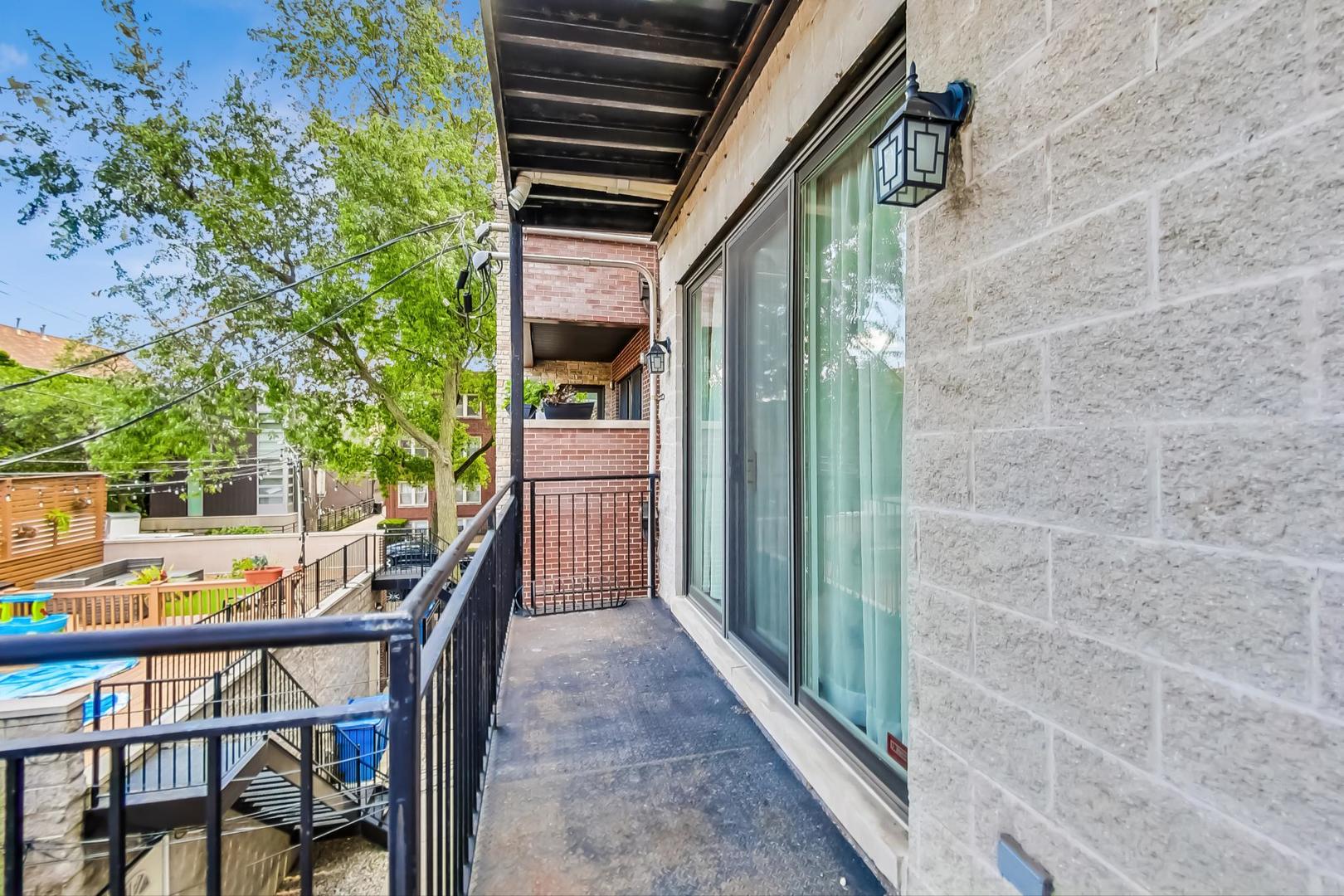 2035 North Leavitt Street, Unit 2 Chicago, IL 60647 - Photo 36 of 44 a view of balcony and patio