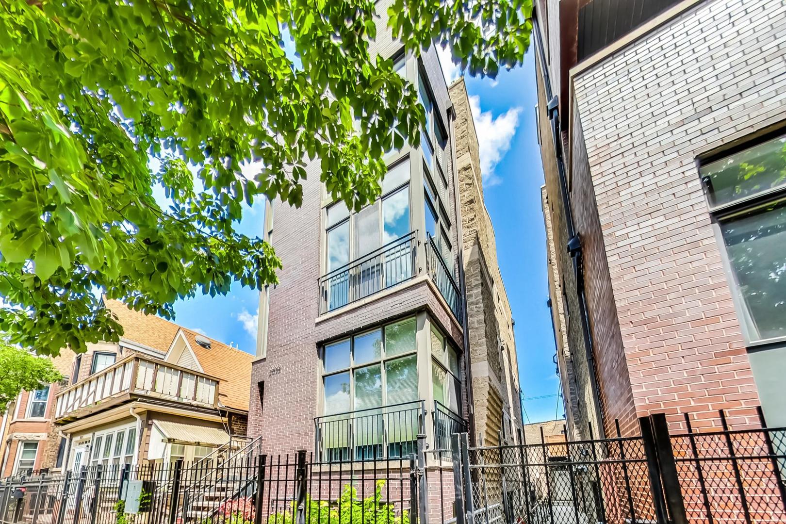 2035 North Leavitt Street, Unit 2 Chicago, IL 60647 - Photo 42 of 44 a view of a multi story building