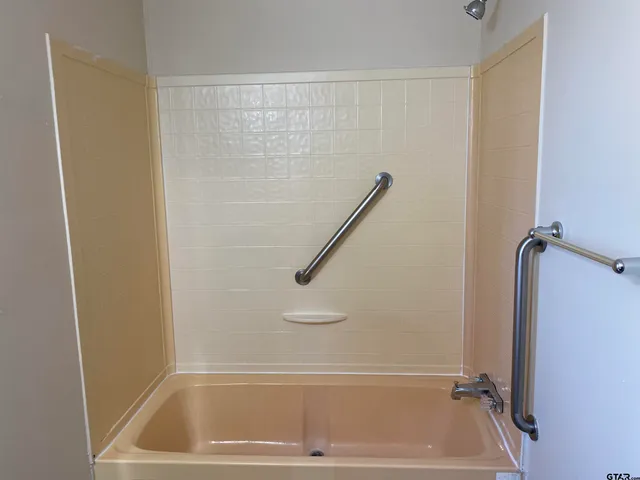 a bathroom with a tub