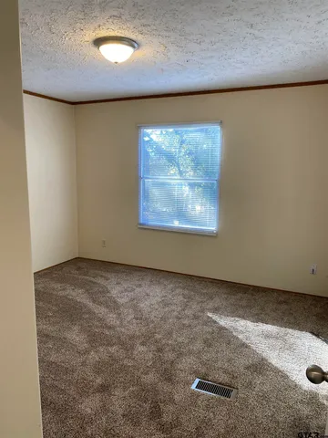 an empty room with a workbench