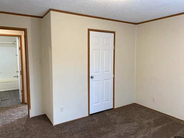 an empty room with closet