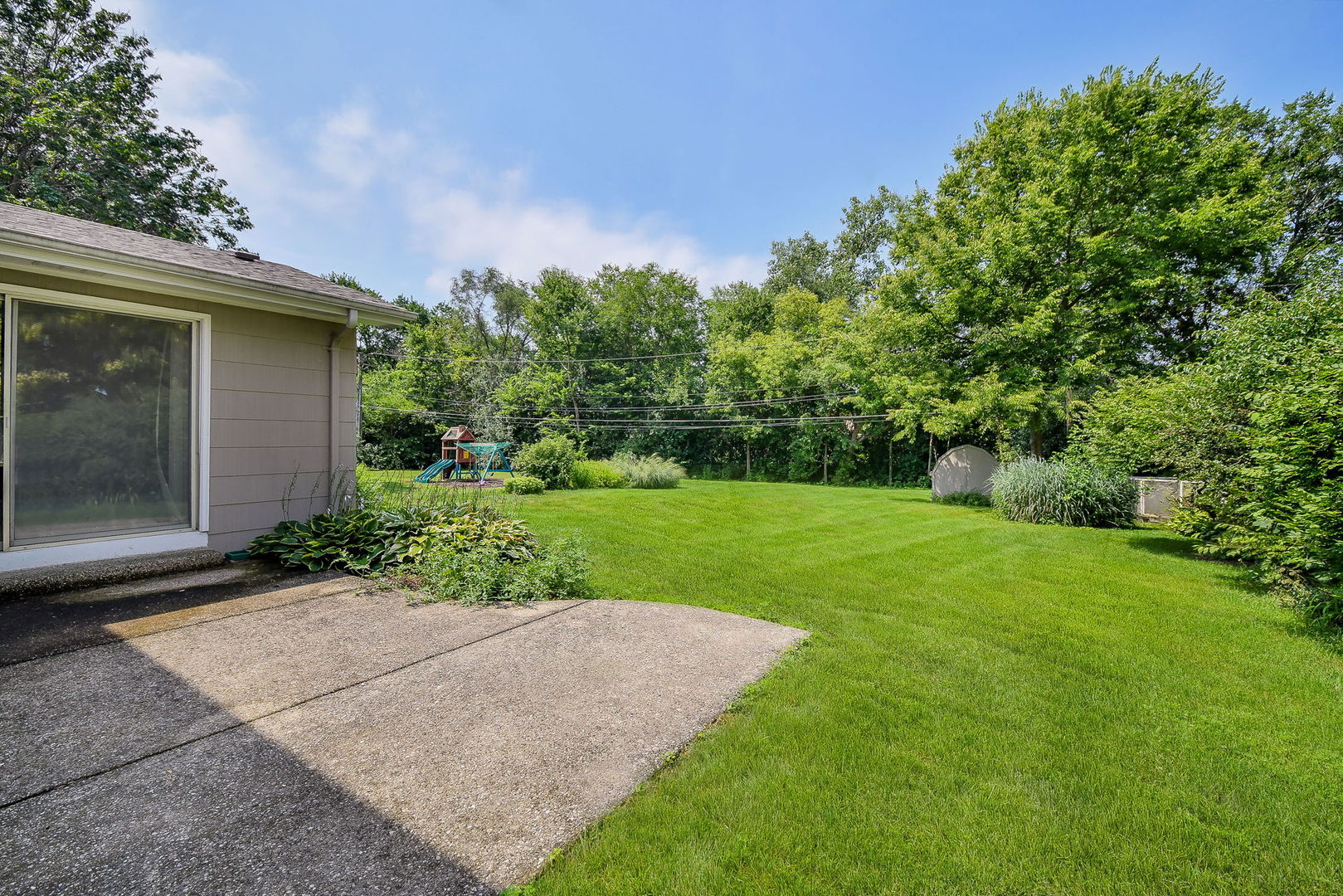 1344 South Main Street Wheaton, IL 60189 - Photo 16 of 20 a view of a house with a yard