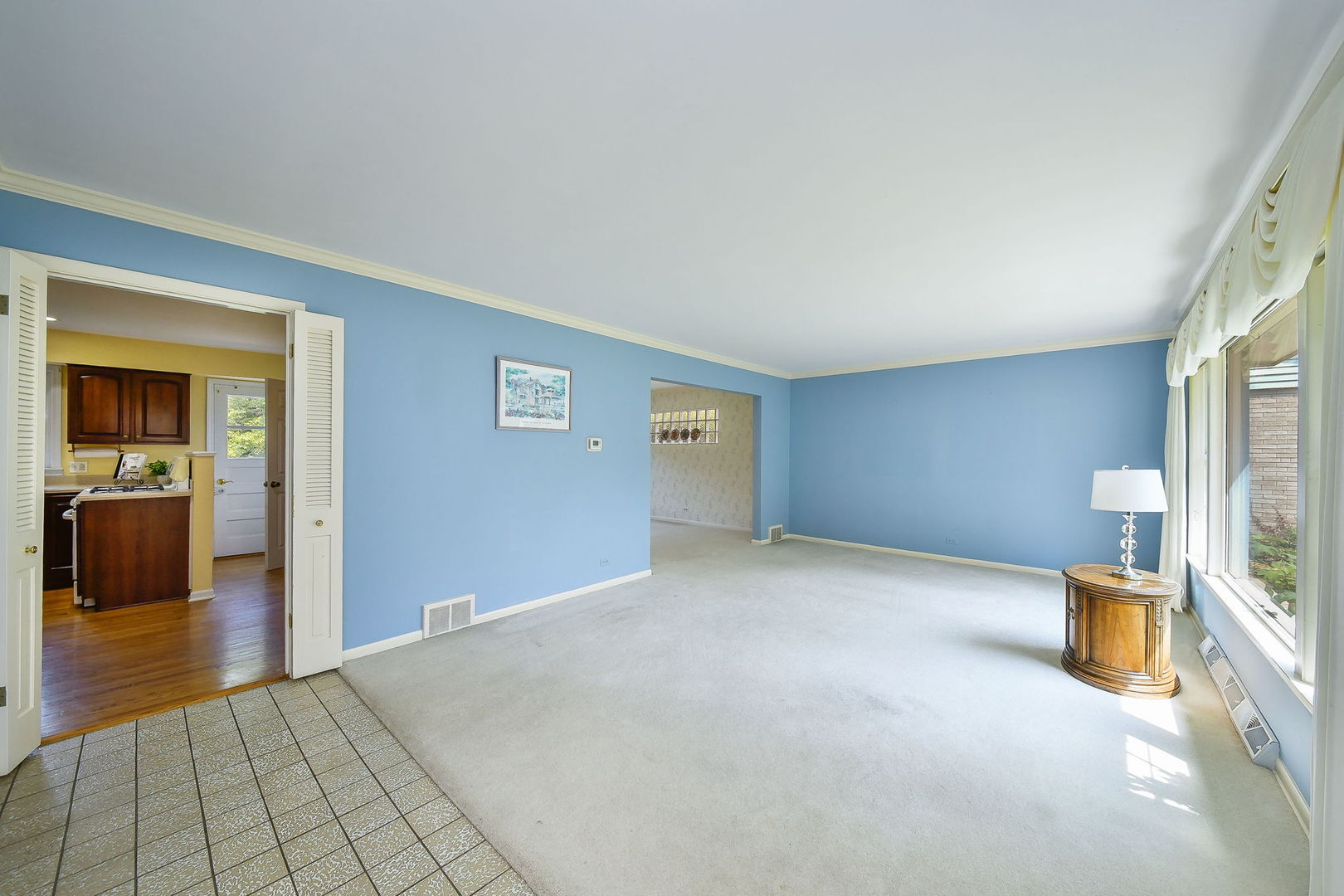 1344 South Main Street Wheaton, IL 60189 - Photo 2 of 20 a view of an empty room with glass door