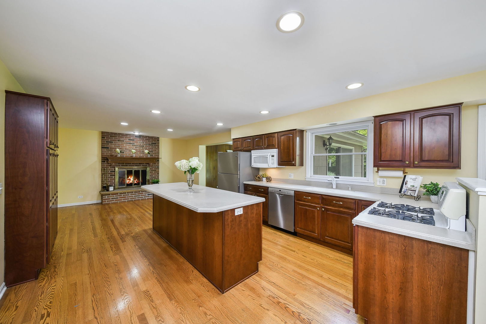 1344 South Main Street Wheaton, IL 60189 - Photo 4 of 20 a large kitchen with cabinets table and chairs