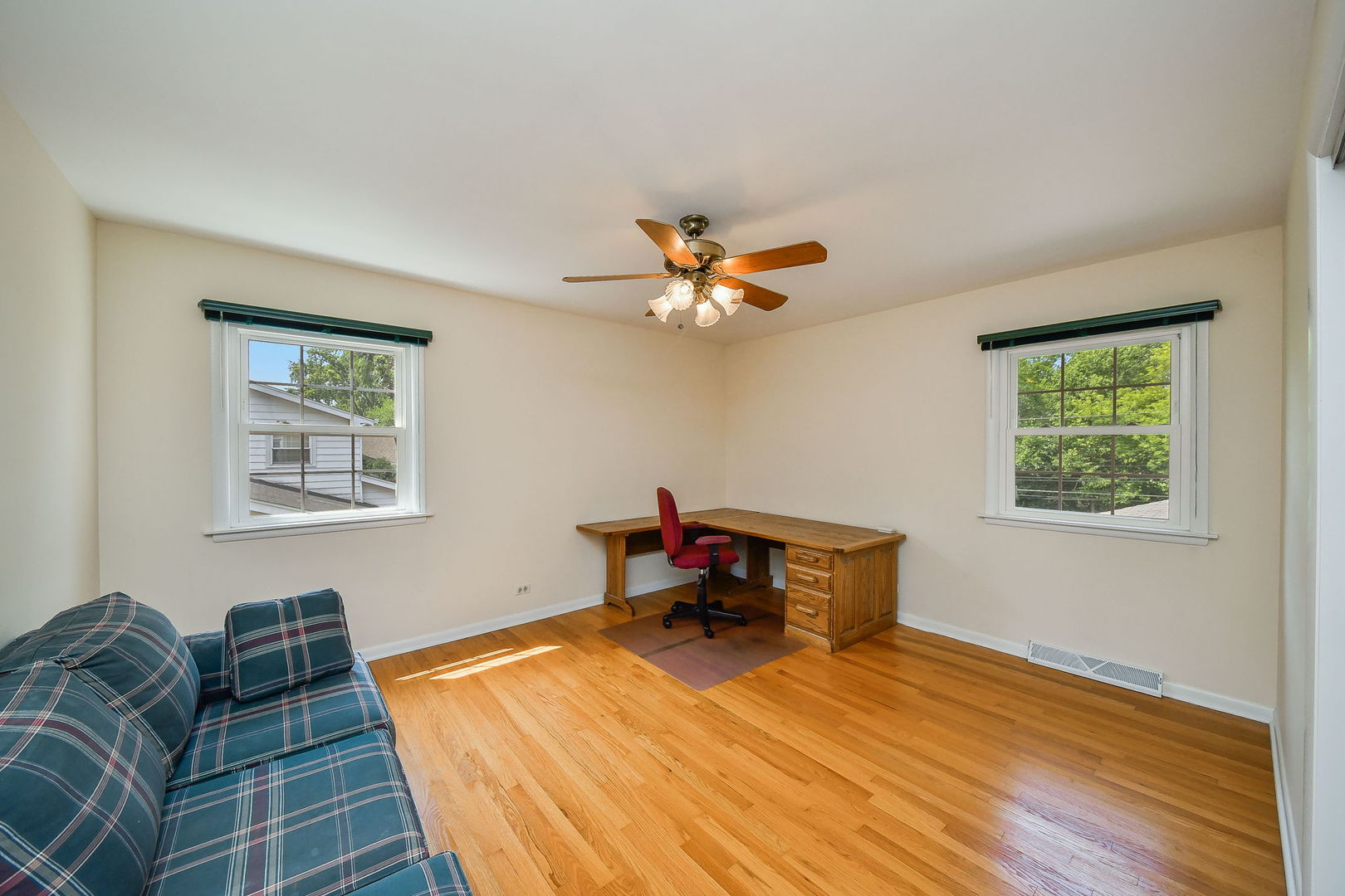 1344 South Main Street Wheaton, IL 60189 - Photo 9 of 20 a room with furniture and a window