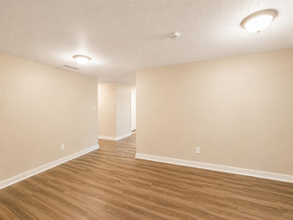1231 Rutherford Drive Mesquite, TX 75149 - Photo 25 of 29 wooden floor in a room