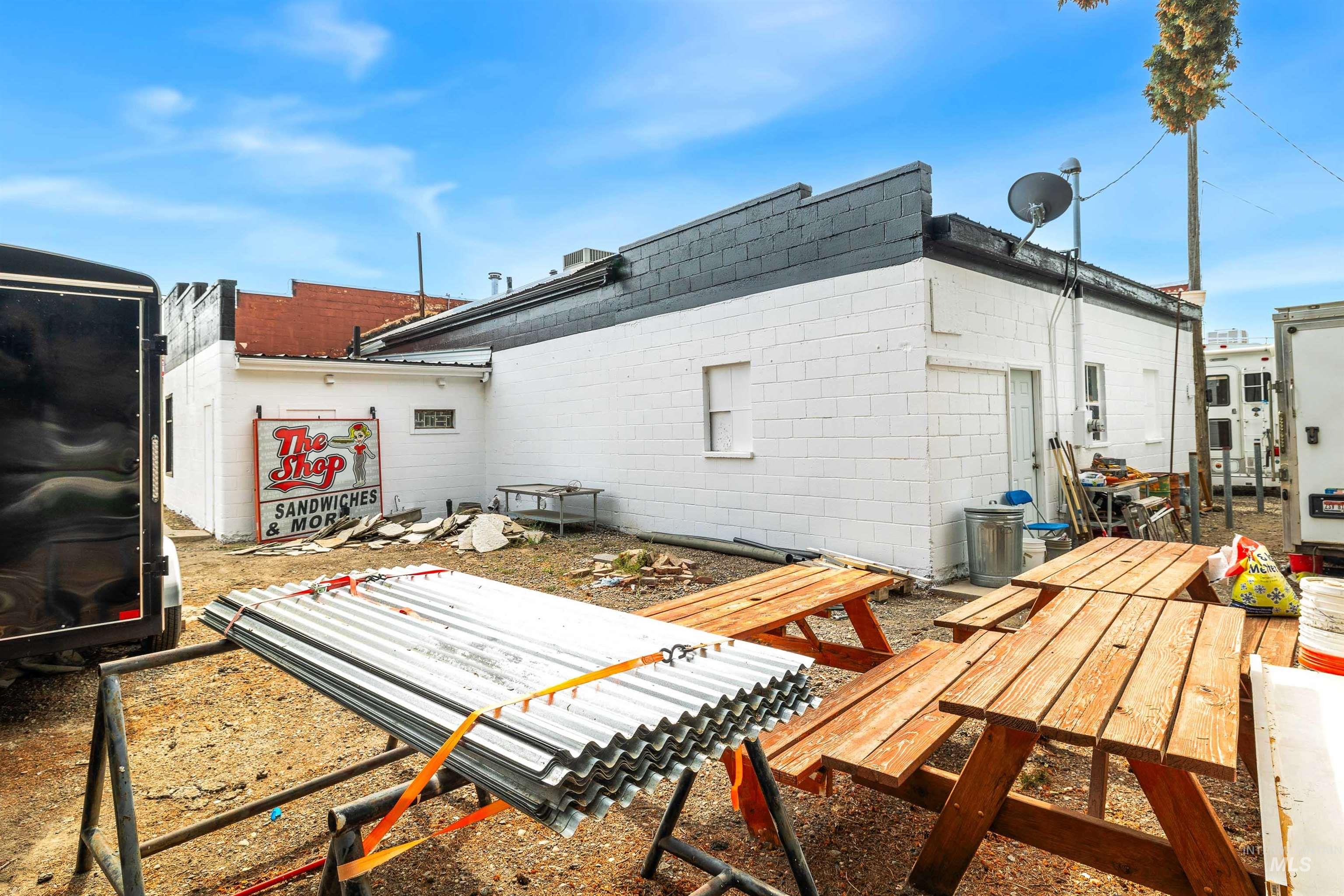2039 Main Street Gooding, ID 83330 - Photo 22 of 31 Rear view of house featuring concrete block siding