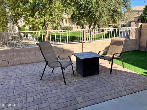 a view of a swimming pool with a lounge chairs