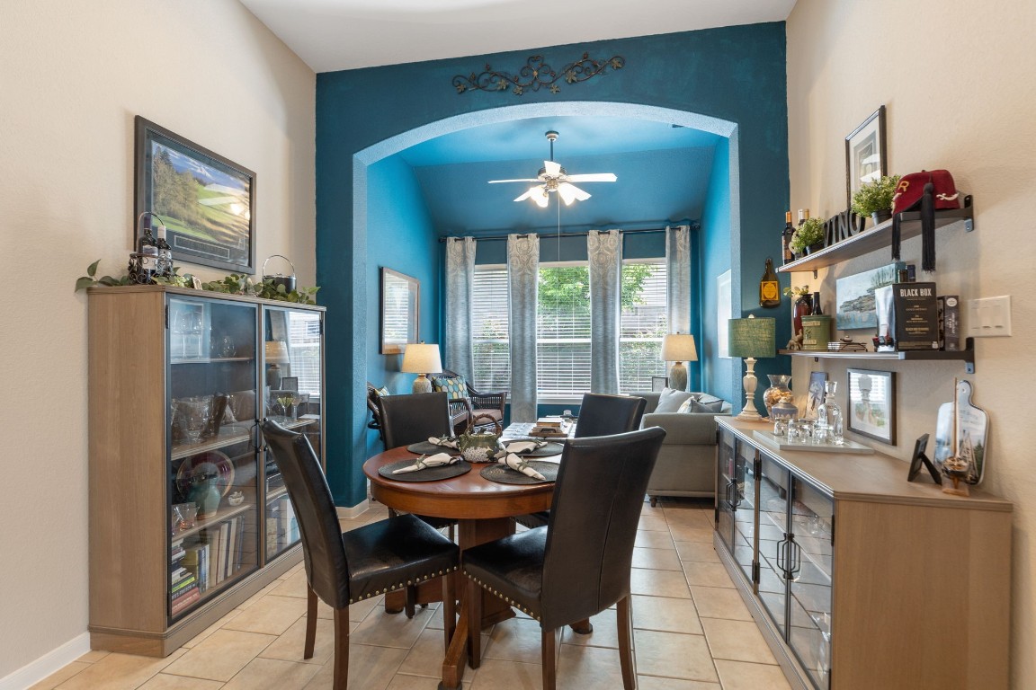 20410 Misty Crossing Lane Spring, TX 77379 - Photo 13 of 50 The breakfast room is located off the kitchen with an additional area to sit and gather while dinner is cooking.