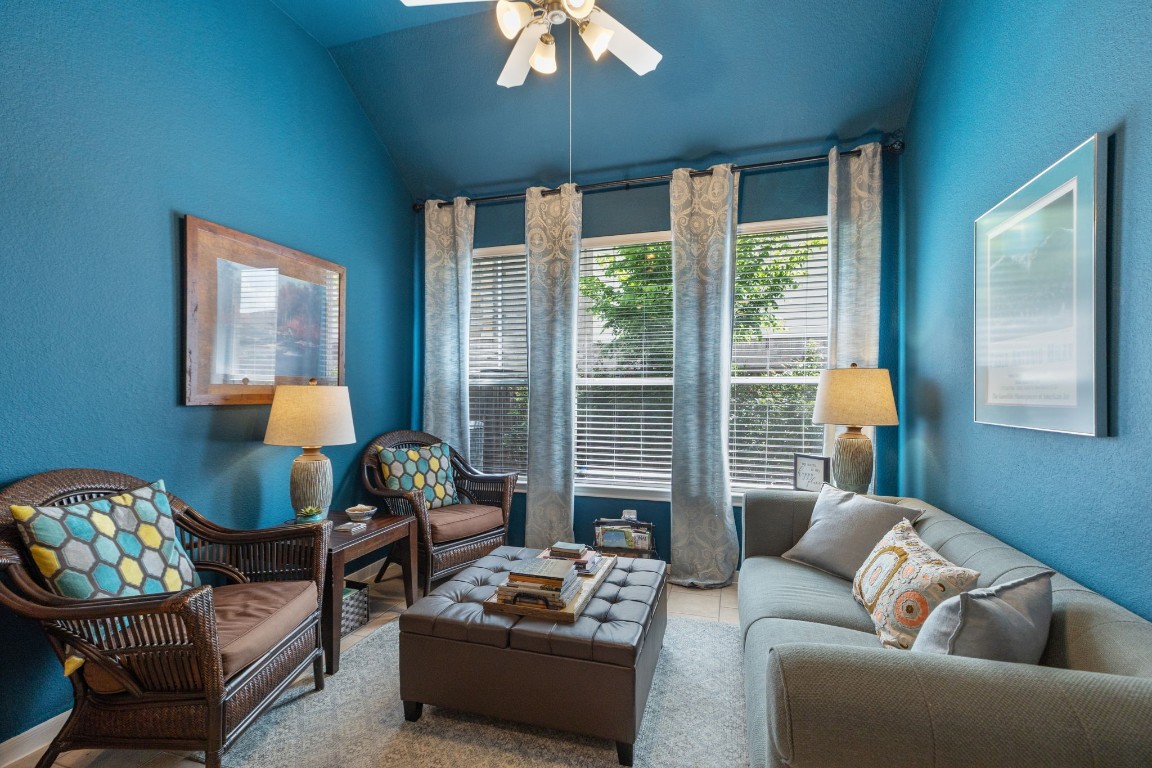 20410 Misty Crossing Lane Spring, TX 77379 - Photo 14 of 50 This cozy gathering room is also perfect to wind down an evening with your favorite beverage.