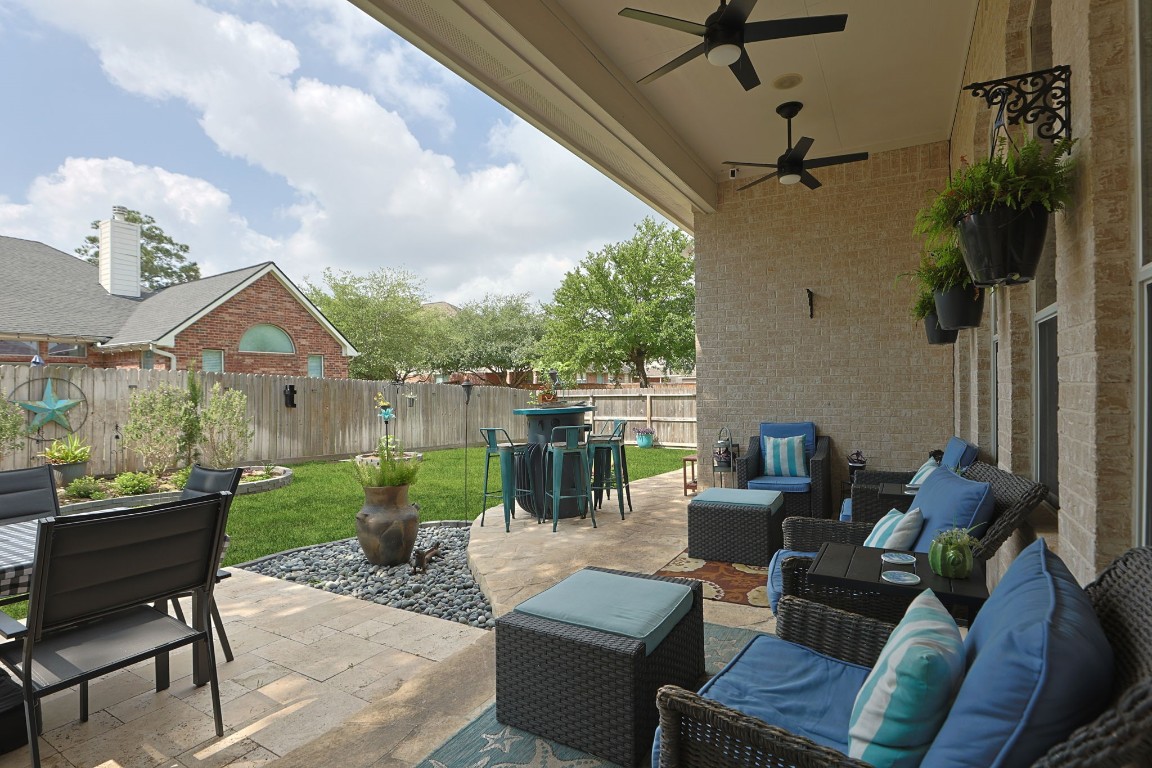 20410 Misty Crossing Lane Spring, TX 77379 - Photo 30 of 50 Step outside to your outdoor covered and extended patio.
