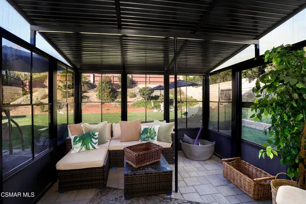 a outdoor living space with furniture and garden view