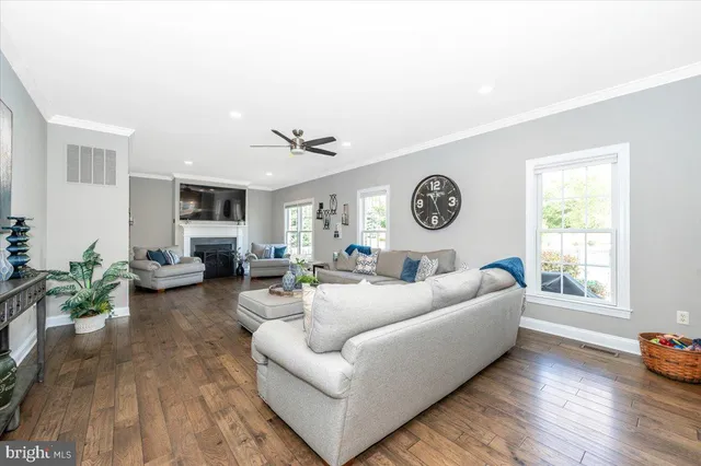 a view of a room with furniture and stairs