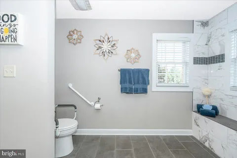 a view of a hallway with windows