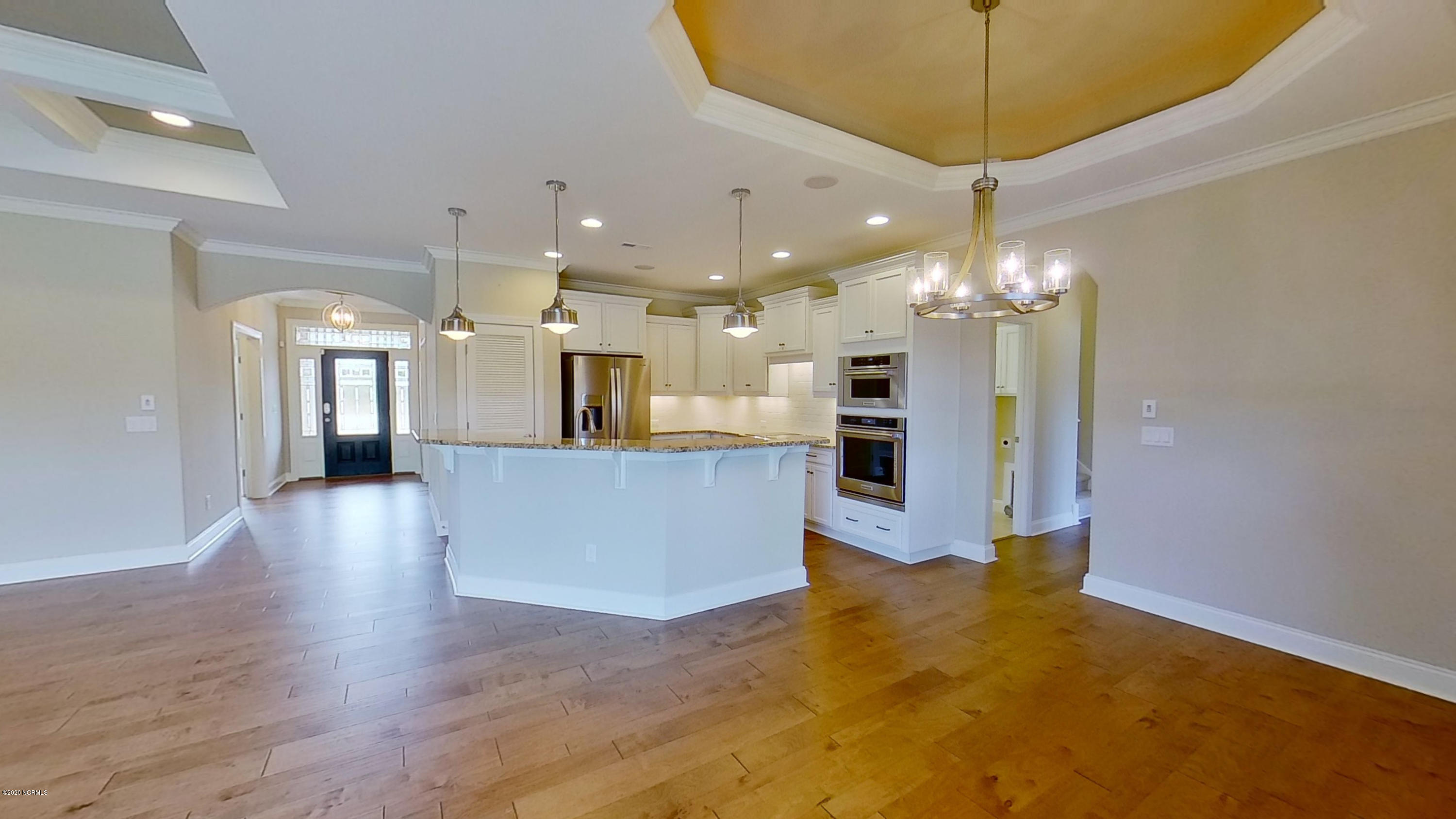2140 Springstone Drive Leland, NC 28451 - Photo 15 of 38 View from dining room into kitchen