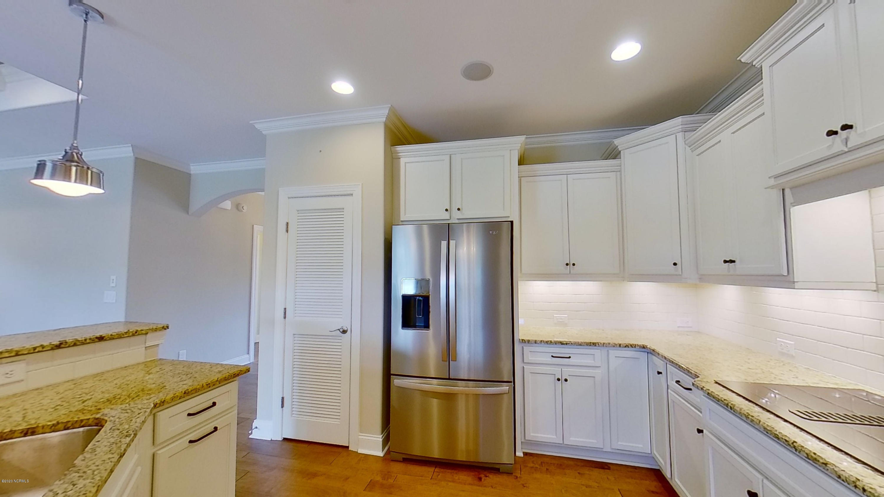 2140 Springstone Drive Leland, NC 28451 - Photo 16 of 38 Kitchen includes stainless steel French door refrigerator