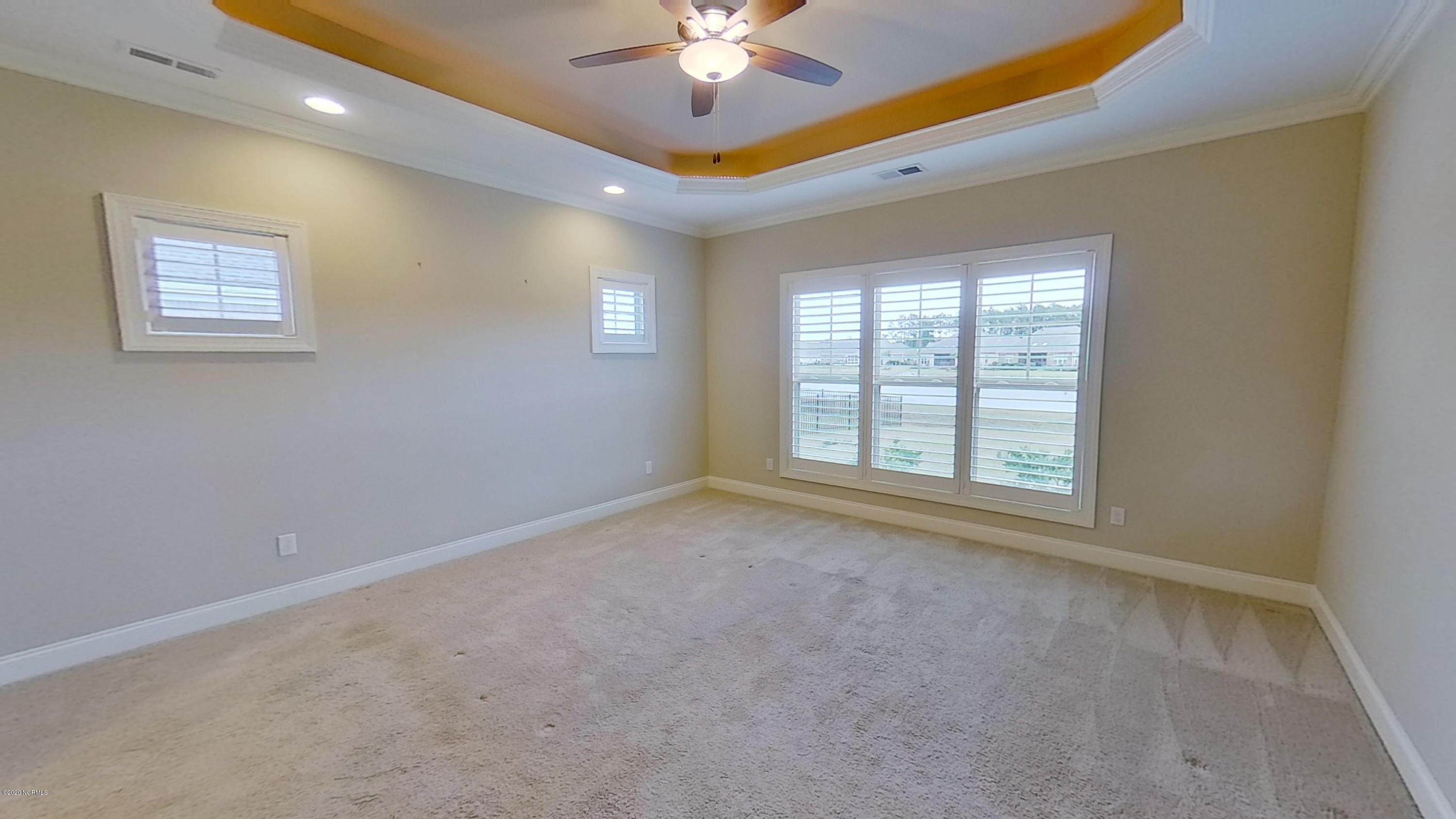 2140 Springstone Drive Leland, NC 28451 - Photo 23 of 38 Spacious master suite has view of pond