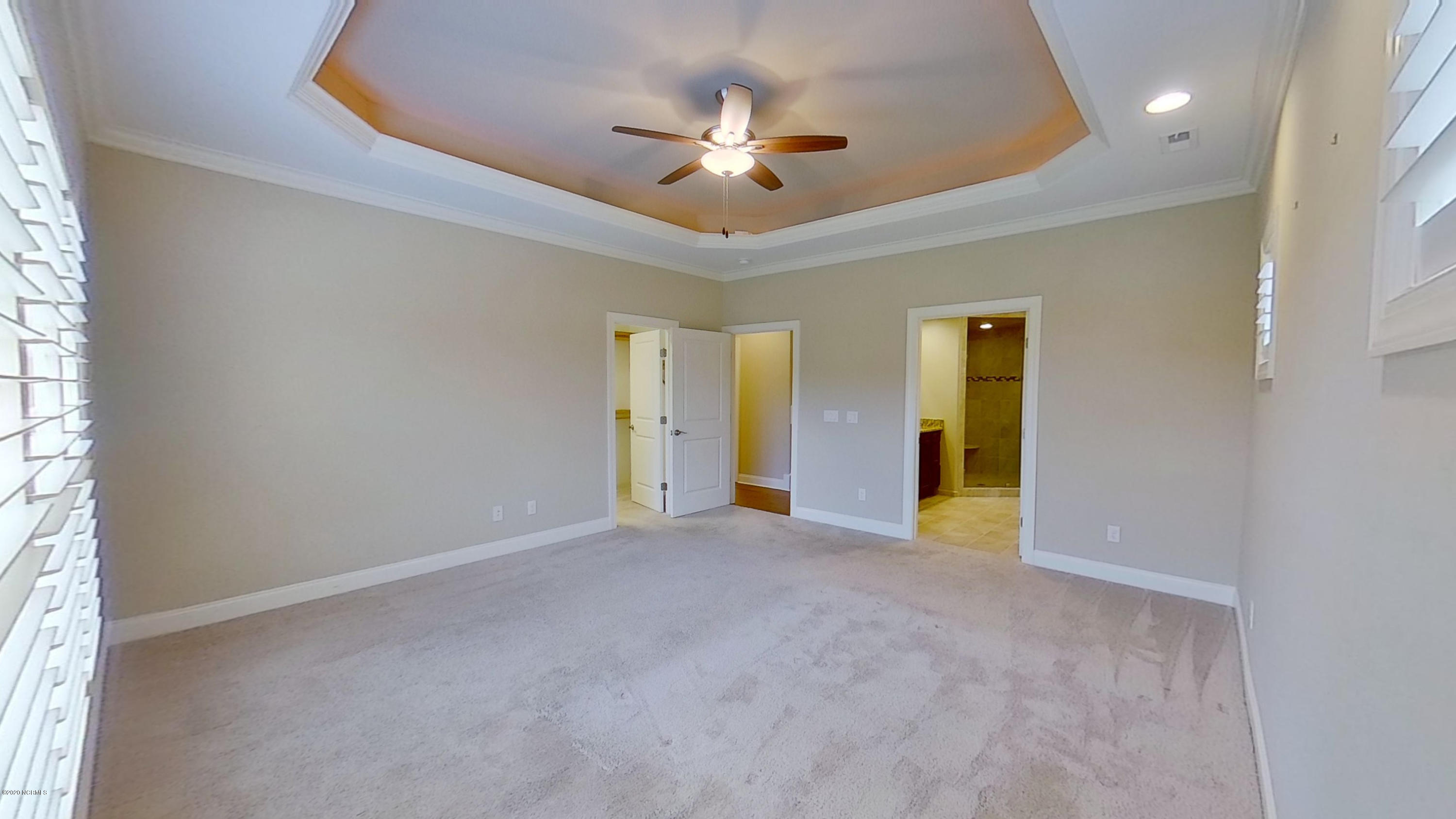 2140 Springstone Drive Leland, NC 28451 - Photo 24 of 38 Master suite has illuminated trey ceiling