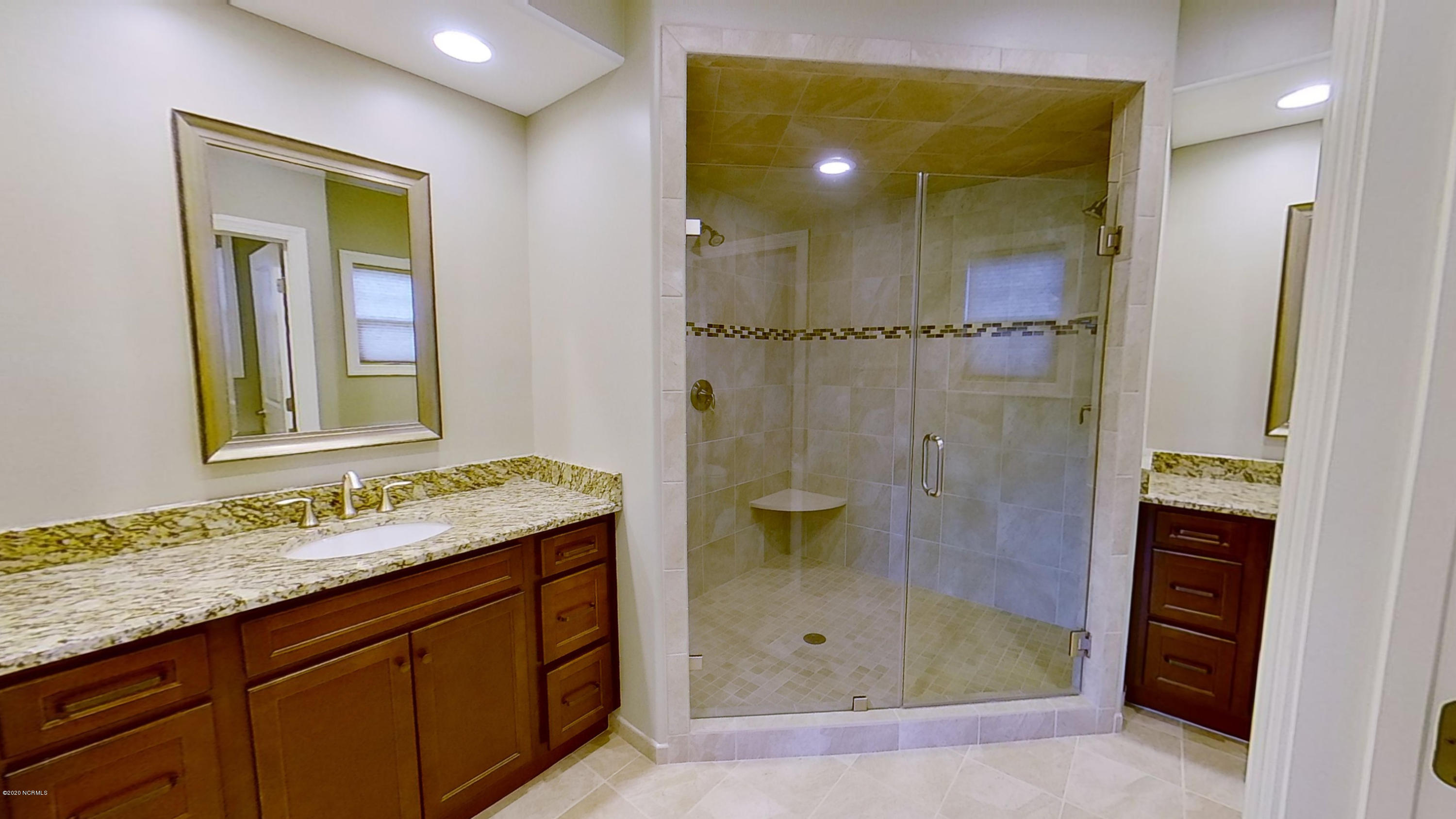 2140 Springstone Drive Leland, NC 28451 - Photo 26 of 38 Private master bath includes separate vanities and step in tile shower