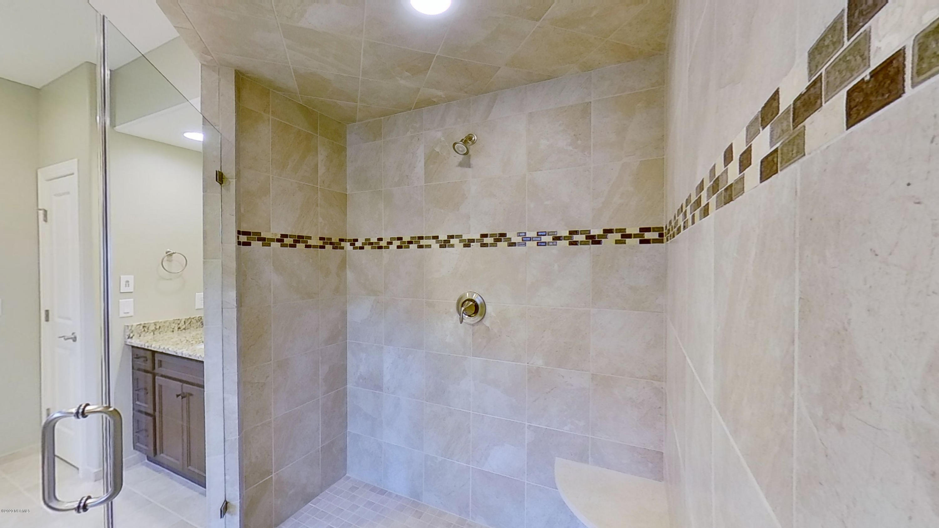 2140 Springstone Drive Leland, NC 28451 - Photo 27 of 38 Tile shower includes two shower heads