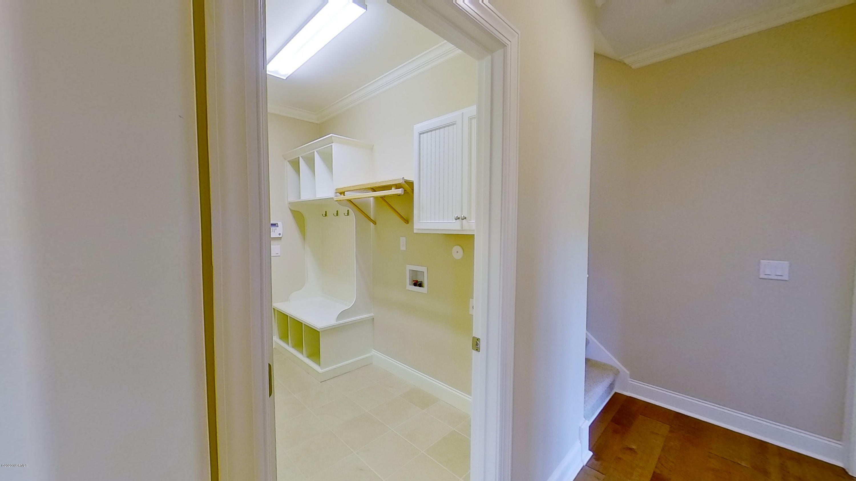 2140 Springstone Drive Leland, NC 28451 - Photo 32 of 38 Laundry room with space for your own washer and dryer